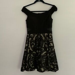 Xscape Off the Shoulde Black Mini Dress w/ Side Mesh Cutouts Size 4 Petite